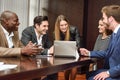 Group of multiethnic busy people working in an office Royalty Free Stock Photo