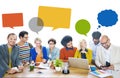 Group of Multiethnic Cheerful Designers with Speech Bubbles
