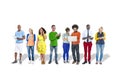 Group of Multiethnic Colorful People Using Digital Devices Royalty Free Stock Photo