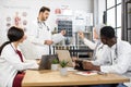 Group of multiethnic doctors having consilium at hospital Royalty Free Stock Photo