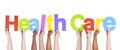 Group of Multiethnic Hands holding Health Care