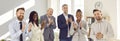 Group of happy diverse business people looking at the camera, smiling and applauding. Royalty Free Stock Photo