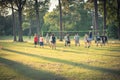 Group of multiethnic people playing outdoor volleyball in summer