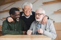 Senior friends embracing in bar Royalty Free Stock Photo