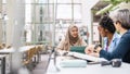 Group of multiethnic students in a library Royalty Free Stock Photo