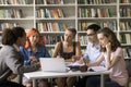 Group of multiethnic students listening opinion of Hispanic schoolmate