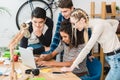 group of multiethnic teenagers looking at laptop Royalty Free Stock Photo