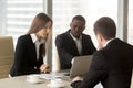 Calm businesswoman listening financial consultants