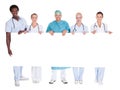 Group of multiracial doctors holding placard Royalty Free Stock Photo