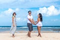 Group of multiracial friends having fun on the beach of tropical Bali island, Indonesia. Royalty Free Stock Photo