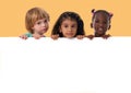 Group of multiracial kids portrait with white board.Isolated Royalty Free Stock Photo