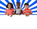 Group of multiracial kids portrait with white board Royalty Free Stock Photo