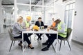 Group of multiracial people discussing construction project Royalty Free Stock Photo