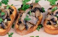 Group of mushroom bruschetta on table