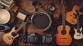 Group of musical instruments including a guitar, drum, keyboard, tambourine. Top view Royalty Free Stock Photo