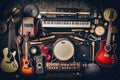 Group of musical instruments including a guitar, drum, keyboard, tambourine. Top view Royalty Free Stock Photo