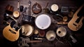 Group of musical instruments including a guitar, drum, keyboard, tambourine. Top view Royalty Free Stock Photo