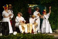 Colombian folklore music group at night outdoor stage Royalty Free Stock Photo