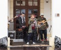 A group of musicians performs on the street in front of The State Philharmonics Sibiu - Thalia Concert Hall. Sibiu city in Romania