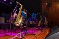 A group of musicians are playing instruments on stage Royalty Free Stock Photo