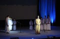 Group of muslim boys singing religious songs on stage during celebrating Islamic holiday Mawlid Prophet Muhammad's