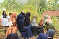 a group of Muslims who are carrying out grave pilgrimage activities