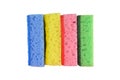 A group of new washing sponges (yellow, green pink and blue), closeup Royalty Free Stock Photo