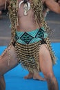 Group of New Zealand Maori folk dancers performing in an outdoor festival. Royalty Free Stock Photo