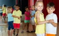 Group of nice children dancing salsa dance