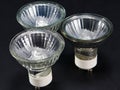 Group of No LED GU10 bulbs, lamps against a black background