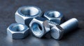 A group of nuts and bolts sitting on top of a table Royalty Free Stock Photo