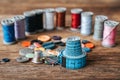 Group of objects about Sewing equipment set on a wooden background. Sewing and tailoring concept. Royalty Free Stock Photo