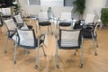 A group of office chairs arranged in a pattern of a circle Royalty Free Stock Photo