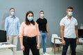 Group Of Office Employees Wearing Face Masks