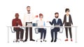 Group of office workers sitting at desk and talking. Male and female clerks taking part in business discussion, work Royalty Free Stock Photo