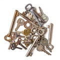 Group of old, battered keys on a white background Royalty Free Stock Photo