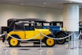 The group of old cars at the retro cars exhibition in the departure area of Domodedovo airport