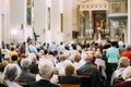 Group Of Old People Parishioners in Cathedral Church