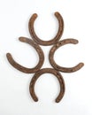 Old rusty horseshoes on white background Royalty Free Stock Photo