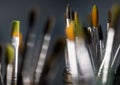 Group of old used paintbrushes in jar. Royalty Free Stock Photo