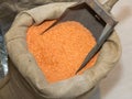 Group of Orange Lentils in a Jute Sack