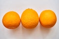 A group of oranges on a table Royalty Free Stock Photo