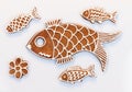 Cute hand painted gingerbread fish cookies on white background Royalty Free Stock Photo
