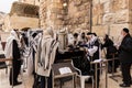 A group of Orthodox believers Jews conduct a joint prayer with the Torah Scrolls near the Kotel in the Old Town of Jerusalem in Is Royalty Free Stock Photo