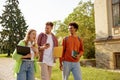 Group of overjoyed students going for class in high school Royalty Free Stock Photo