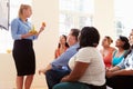 Group Of Overweight People Attending Diet Club