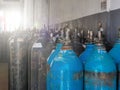 Group of oxygen cylinder tank with compressed gas for industrial use in the factory. Royalty Free Stock Photo