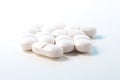 Group of painkiller tablets on white