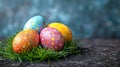 Group of painted eggs are sitting on a green field. Royalty Free Stock Photo