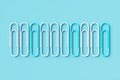 Group Paper clips on a blue background.